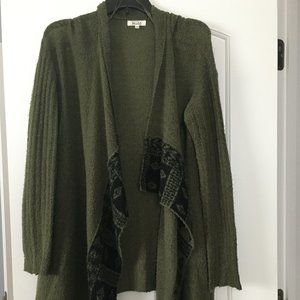dark green sweater